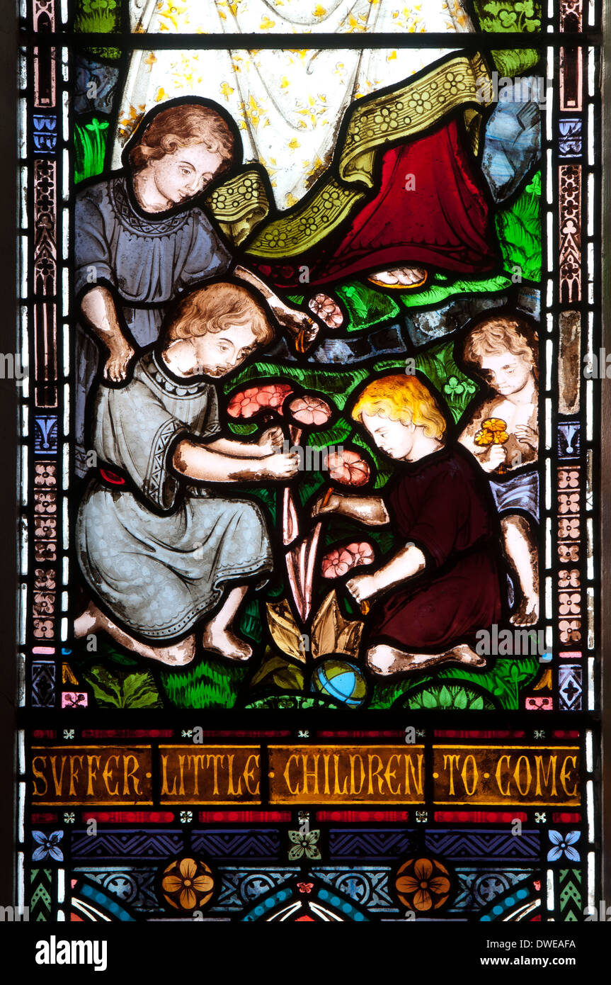 Suffer the little children stained glass, St. Stephen`s Church, Redditch, Worcestershire, UK Stock Photo